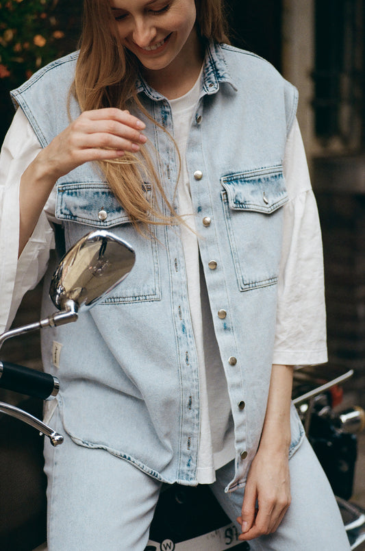 The sleeveless denim jacket